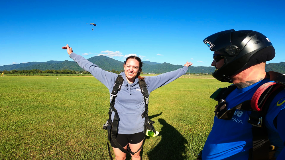 girl smiling after skydiving in cairns