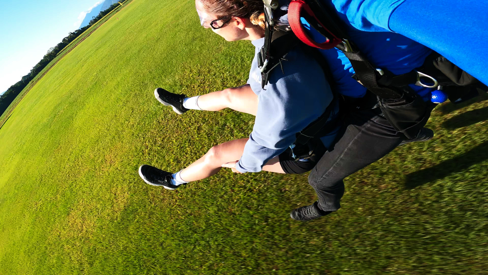 girl skydiving landing