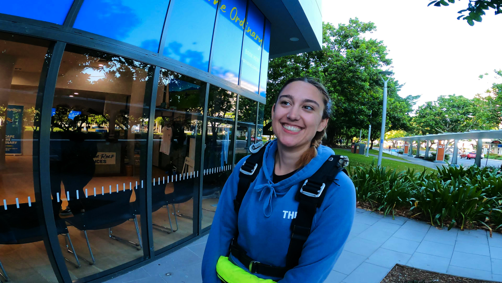 Girl smiling before skydiving in cairns.